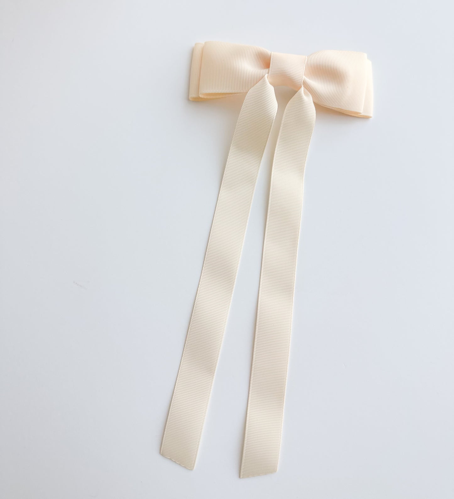 Cream solid grosgrain ribbon bows