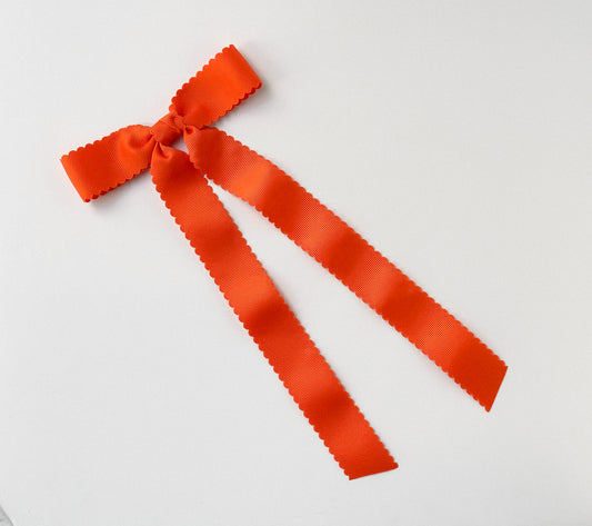 Orange small scalloped solid grosgrain ribbon bows