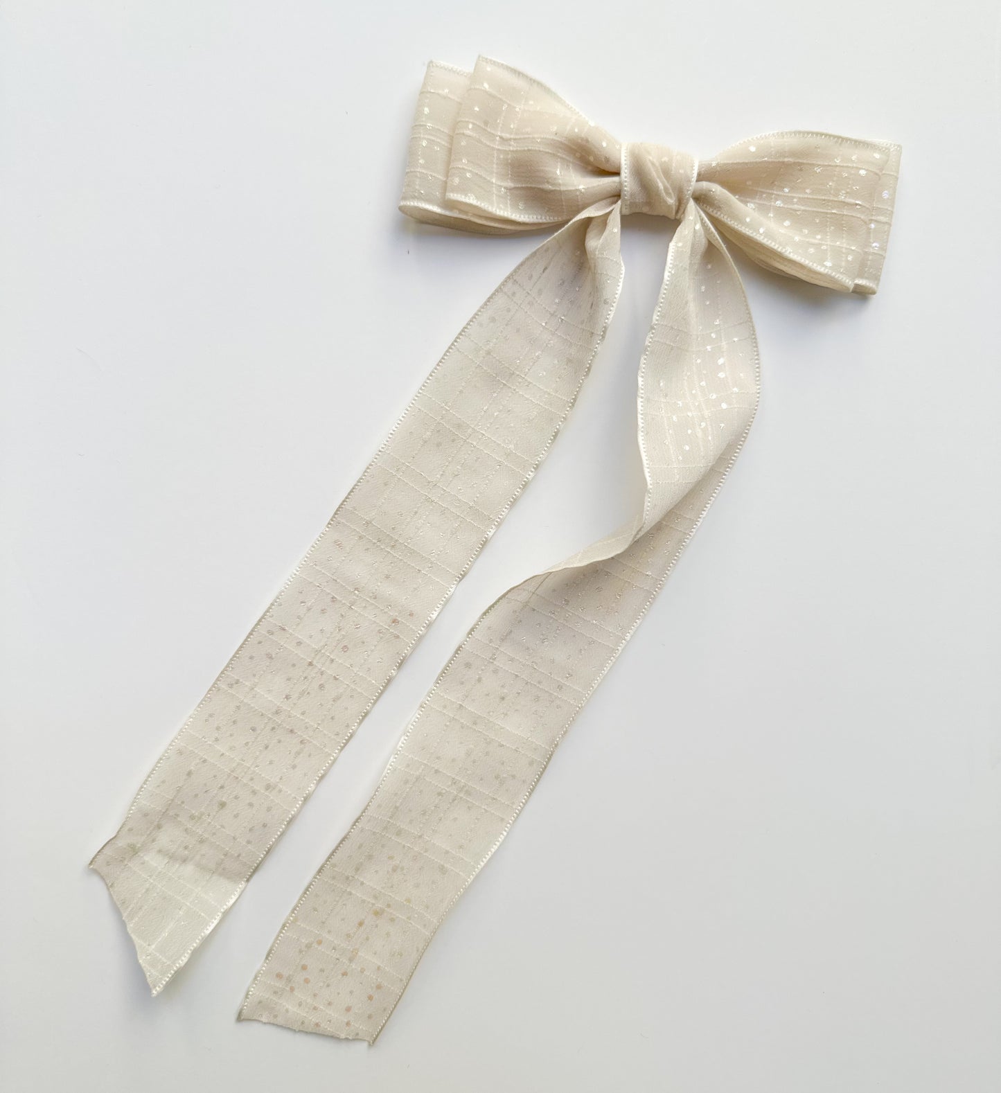 Cream sheer fabric bow