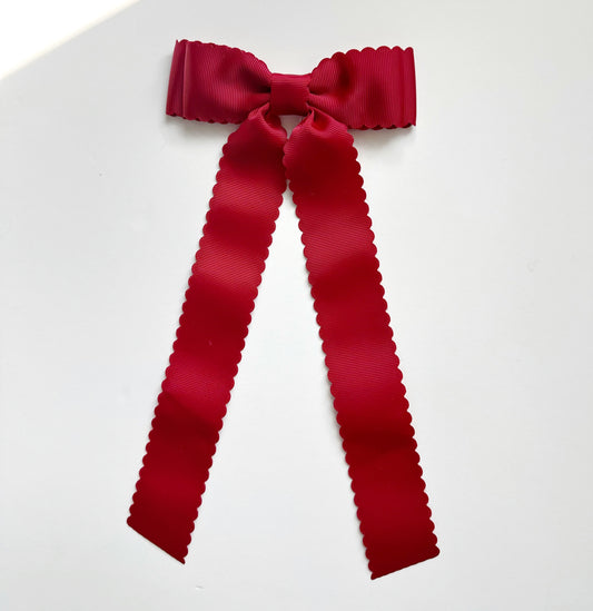 Red scalloped solid grosgrain ribbon bows