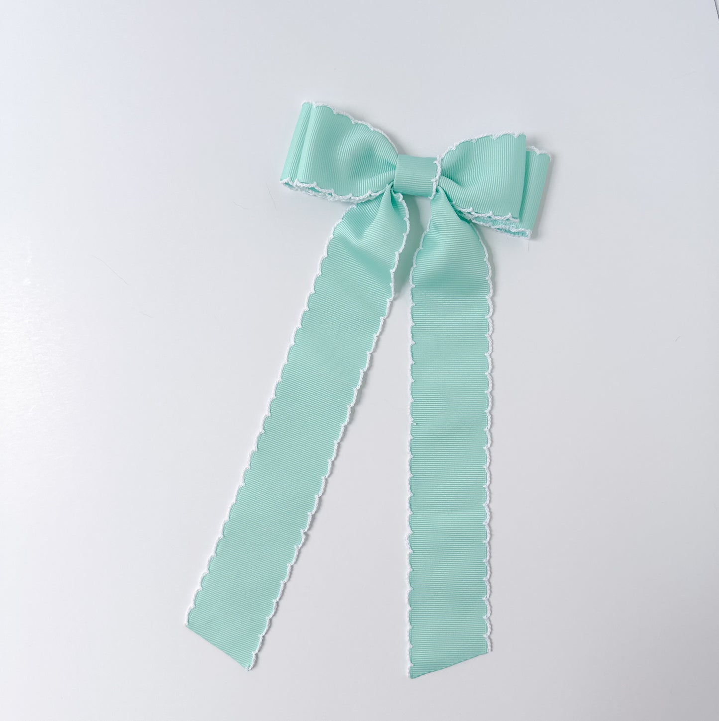 Aqua grosgrain ribbon scalloped moonstitched bows